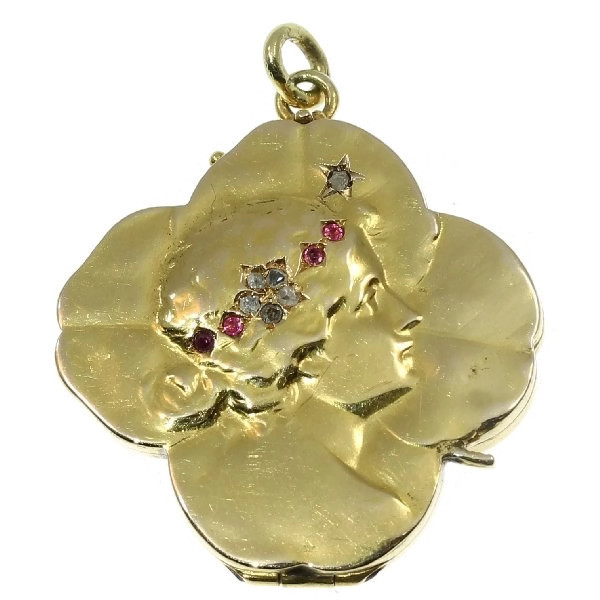 Typical Art Nouveau gold locket four leaf clover with woman head